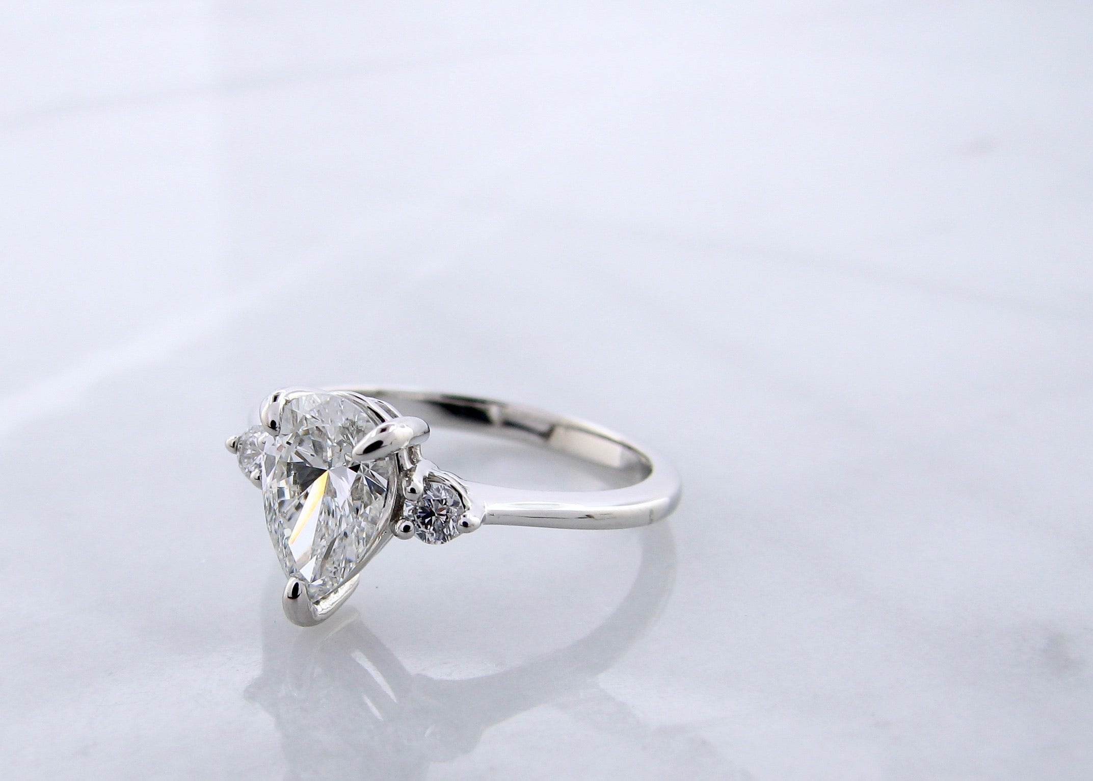 1ct Pear Shape Pure Grown Diamond 1.10TDW Three Stone Platinum Ring