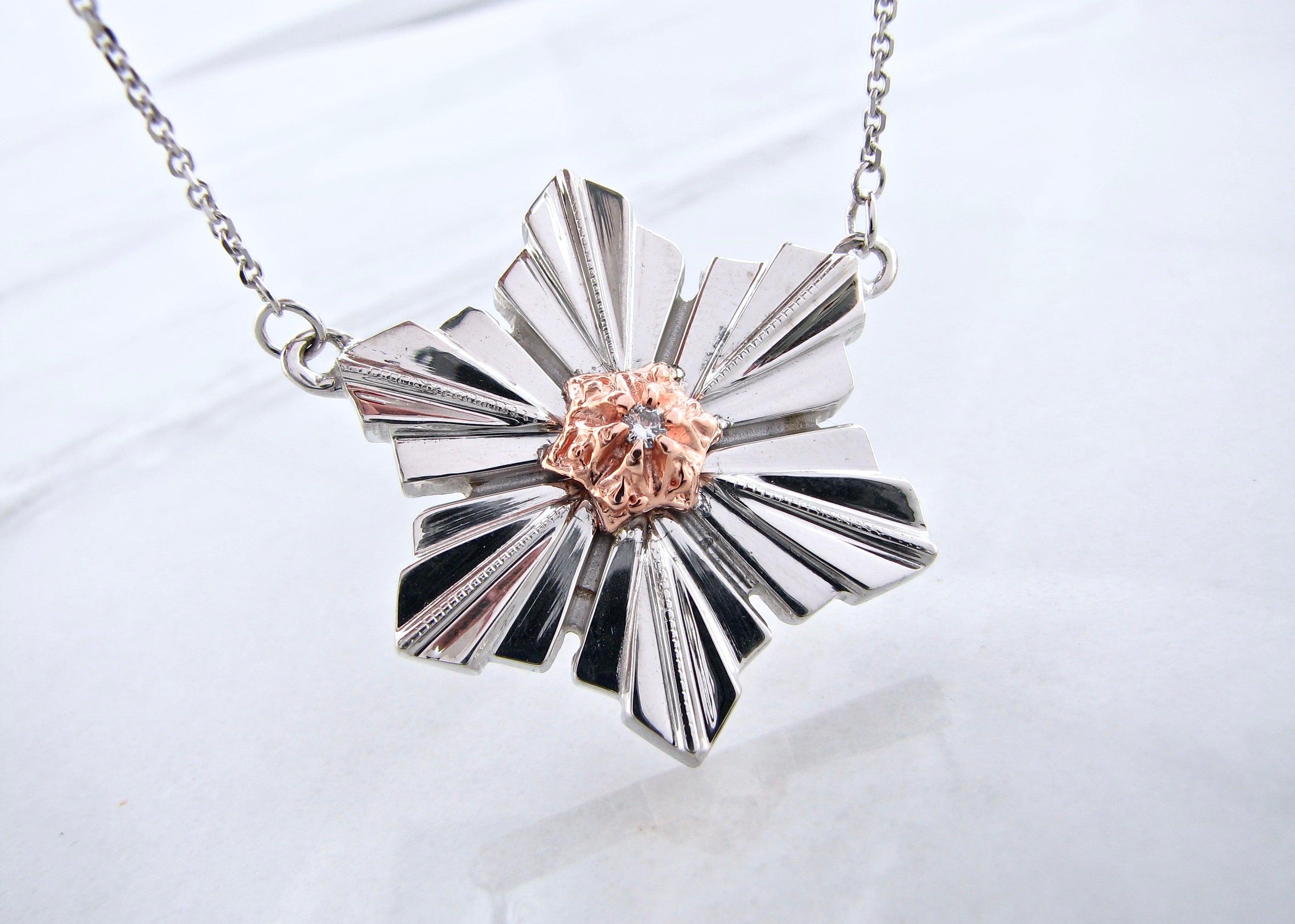 Sterling Silver & 14K Rose Gold
.05ct Diamond