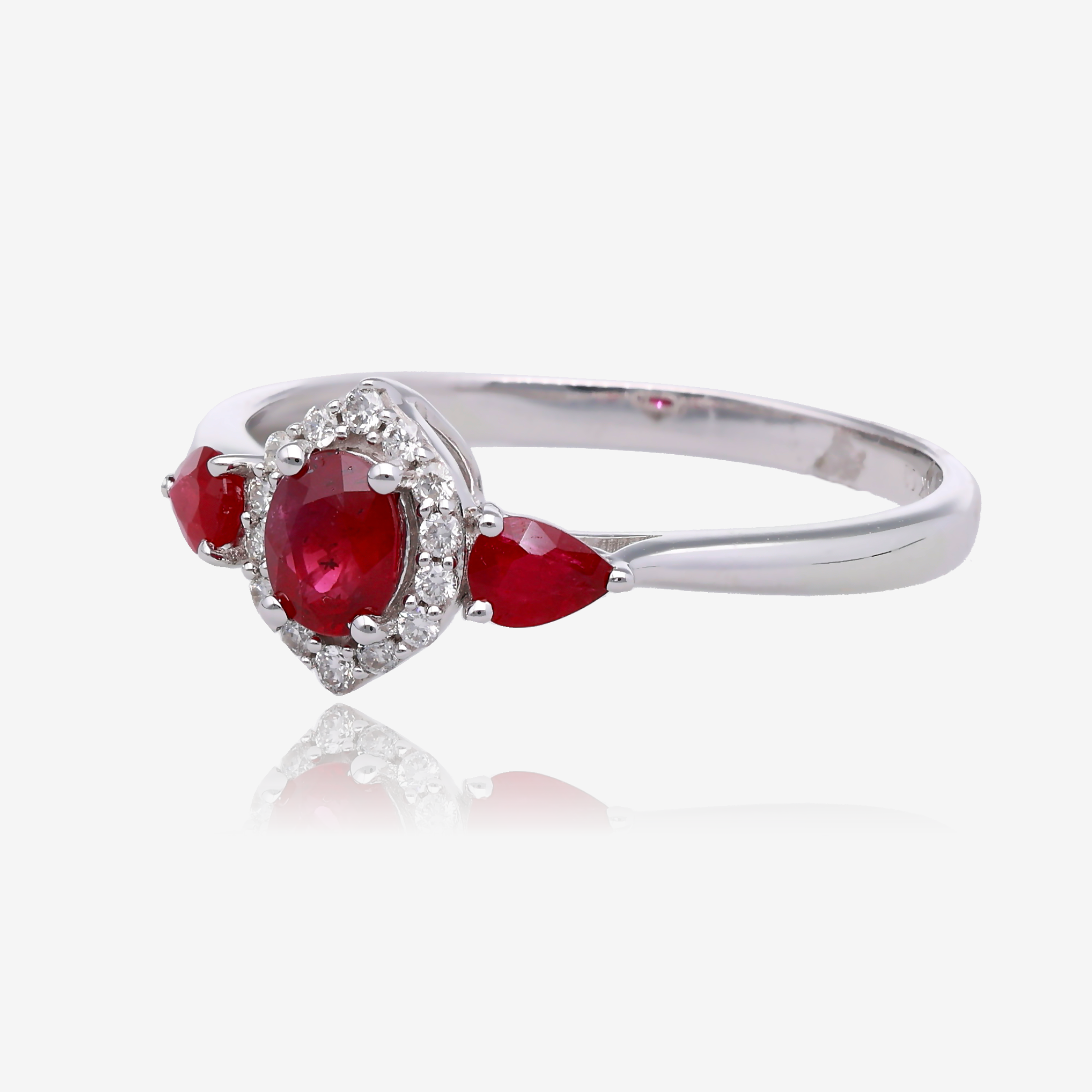 Oval Ruby and Diamond Vintage Halo Ring in 14K White Gold
