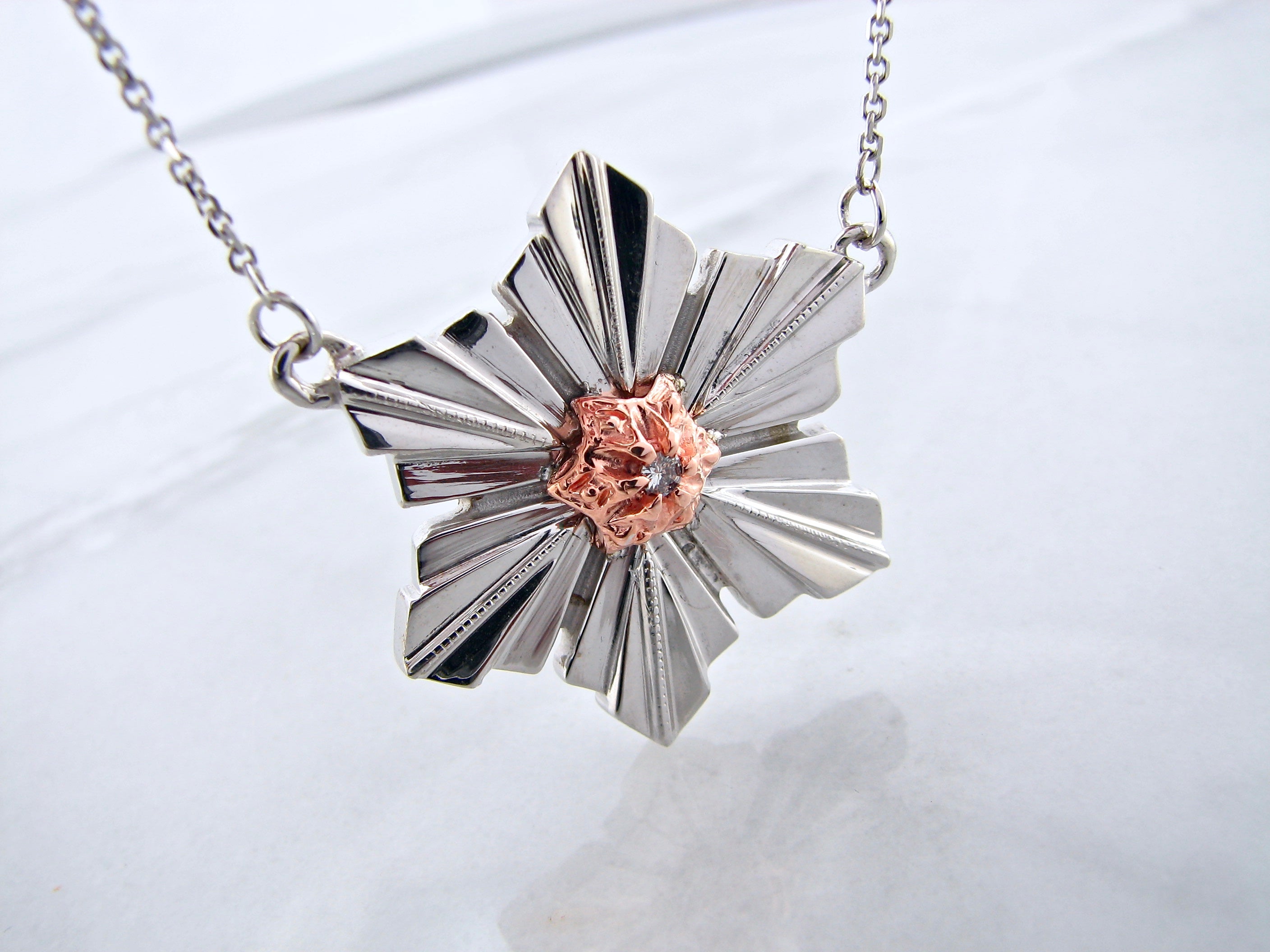 Sterling Silver & 14K Rose Gold
.05ct Diamond