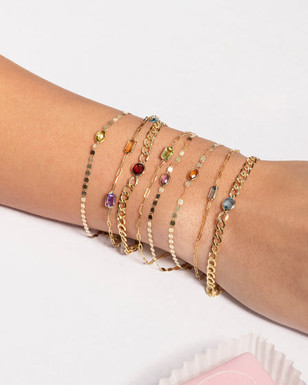 Bezeled Blue Topaz Curb Chain Gold Bracelet