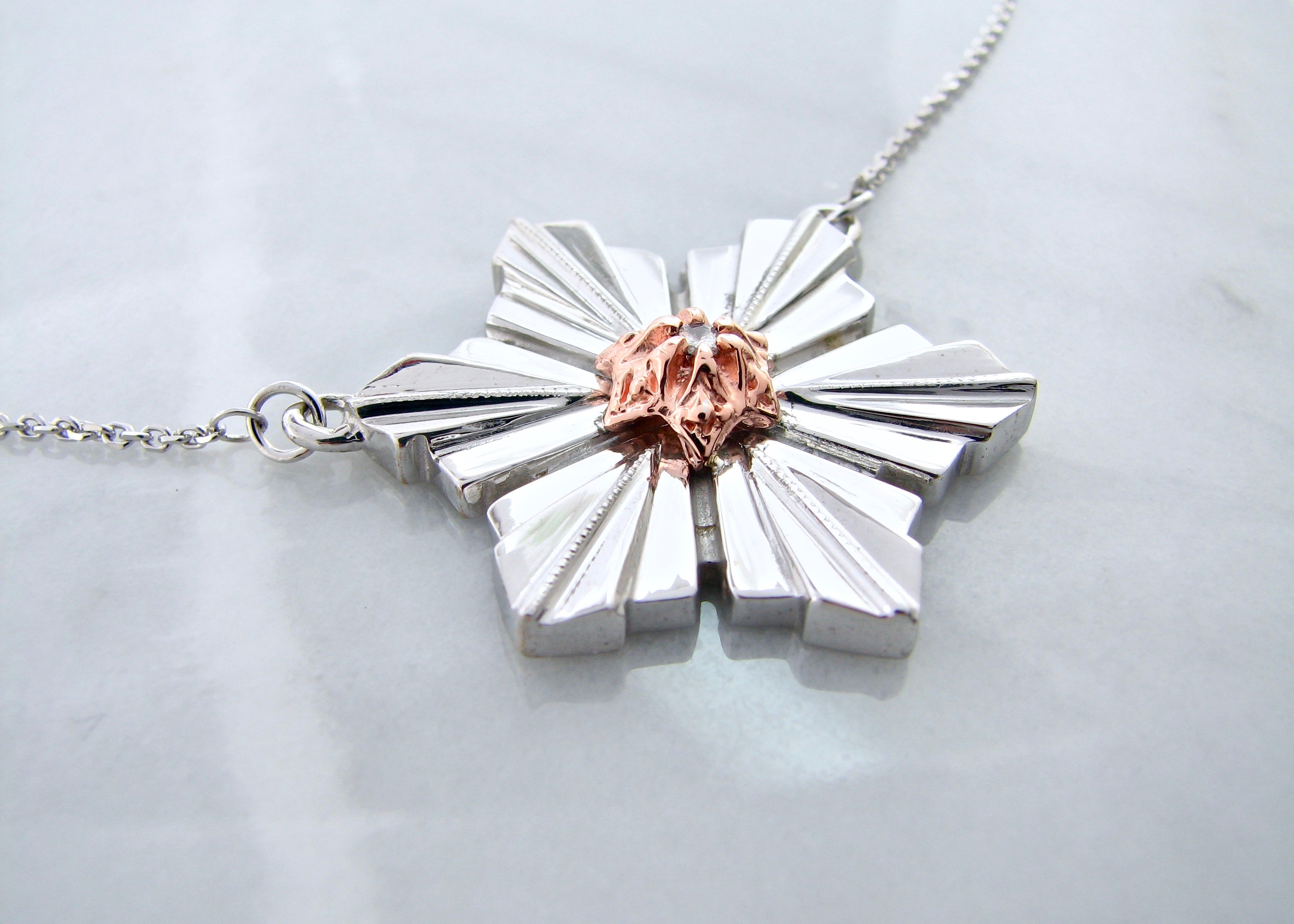 Sterling Silver & 14K Rose Gold
.05ct Diamond