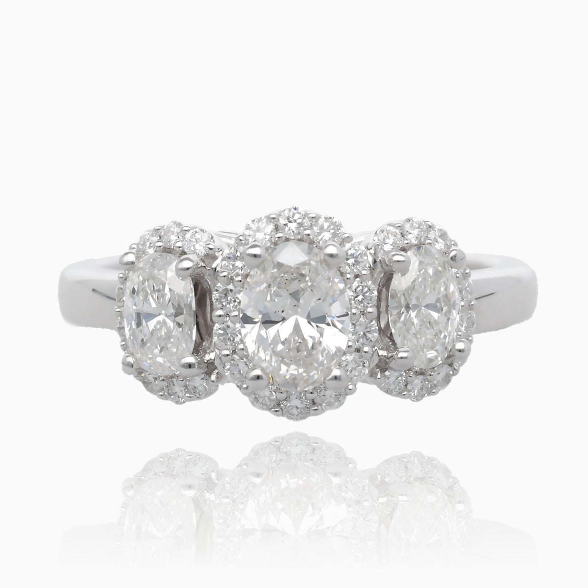 Past Present Future Oval Halo Diamond Ring