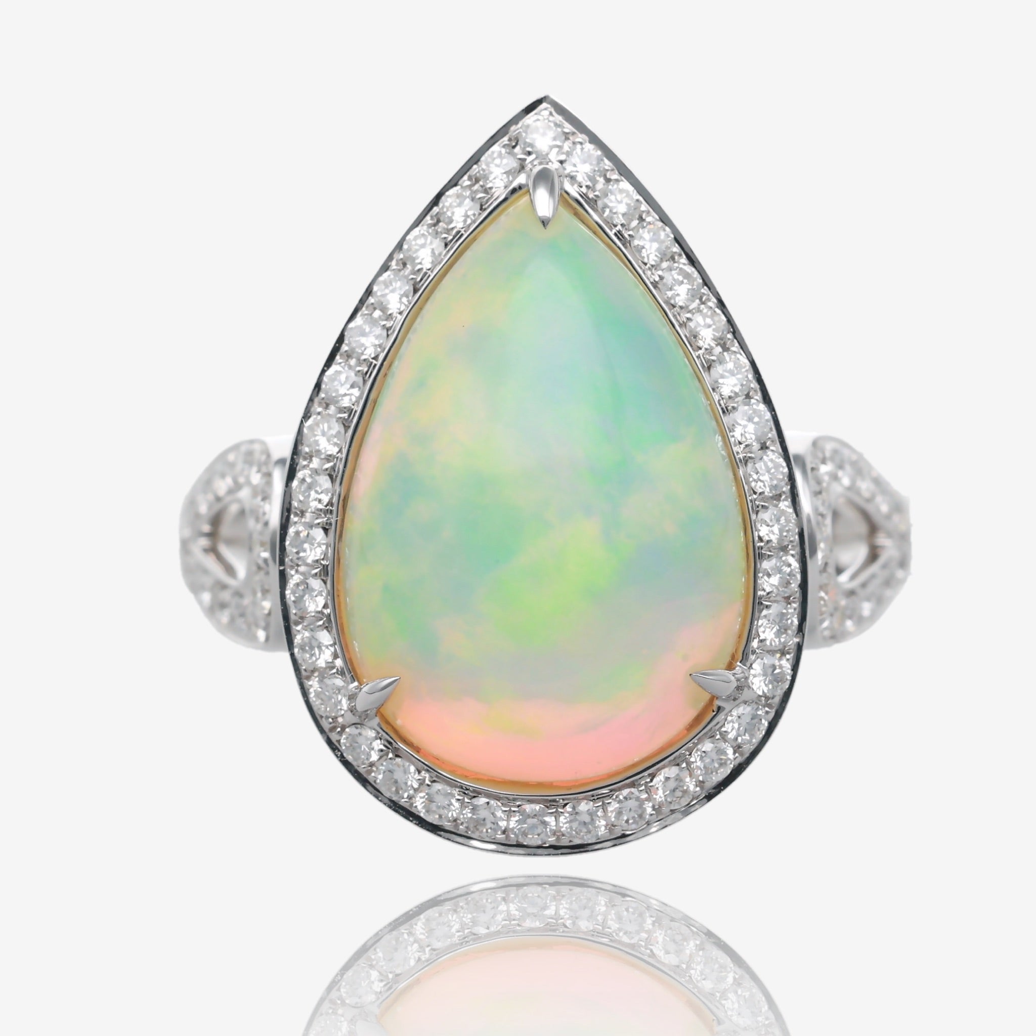 Celestial Glow Ethiopian Opal and Diamond Teardrop Ring in White Gold