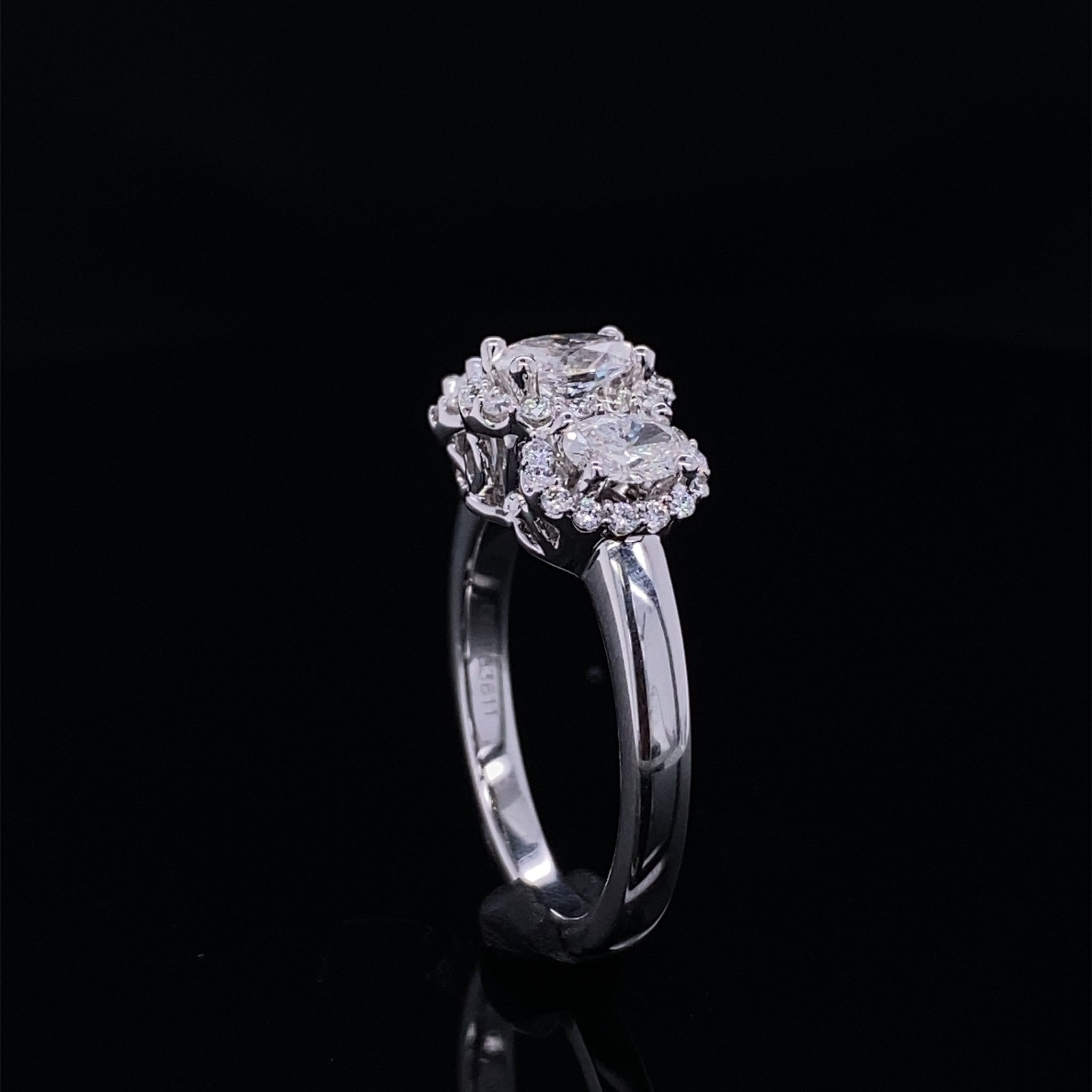 Past Present Future Oval Halo Diamond Ring