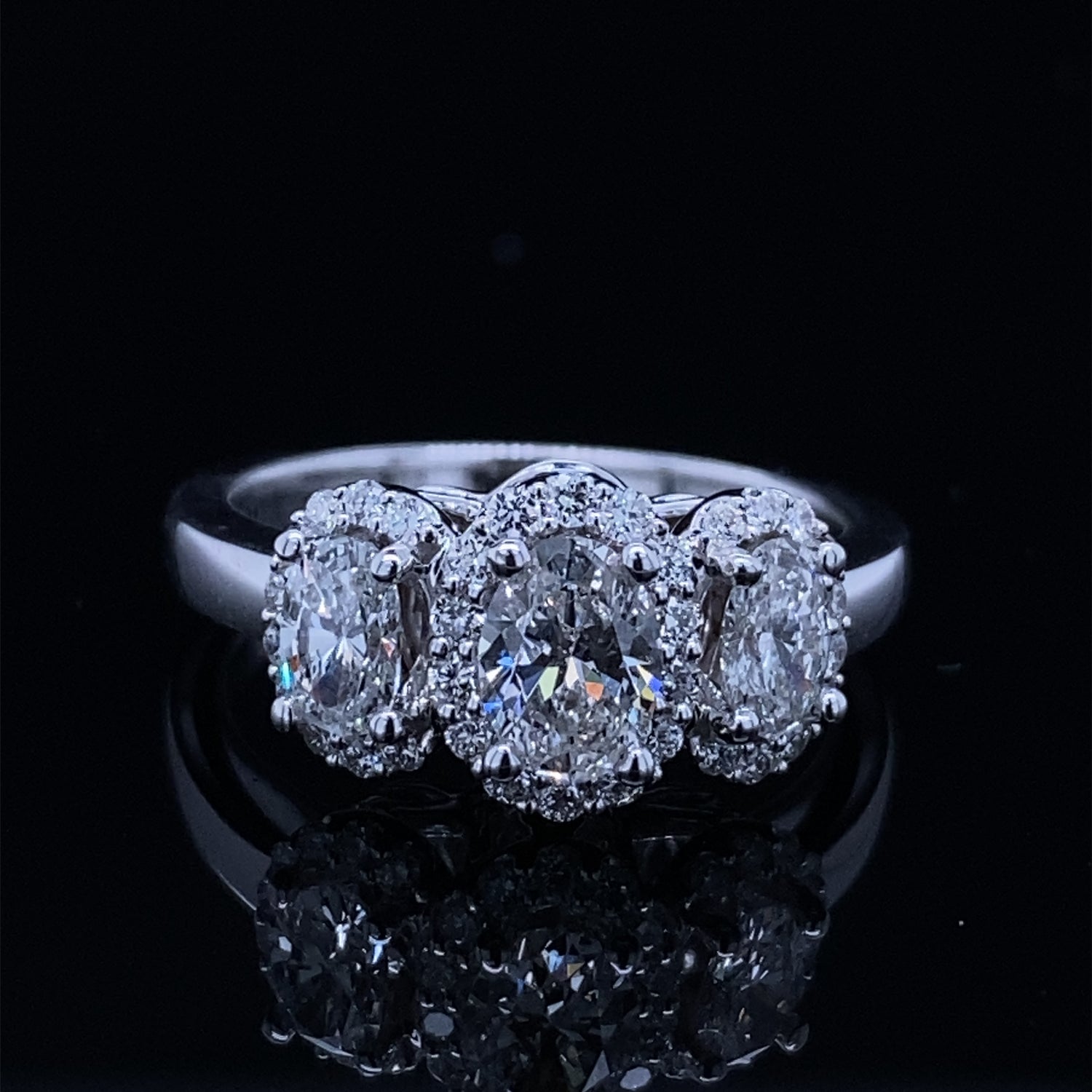 Past Present Future Oval Halo Diamond Ring