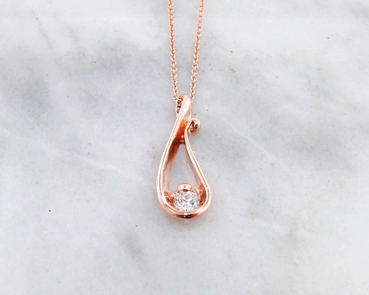 14K Rose Gold
.285ct TDW
SI1-H
18" Chain