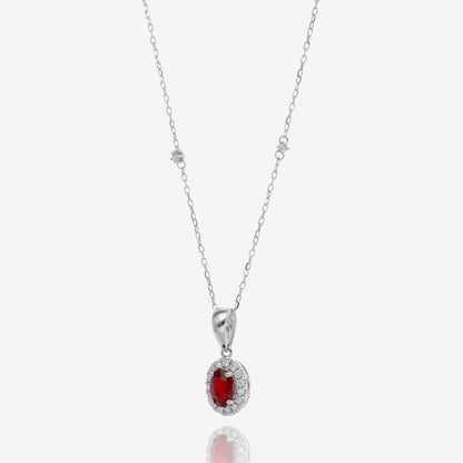 Ruby and Diamond Halo Pendant in 14K White Gold