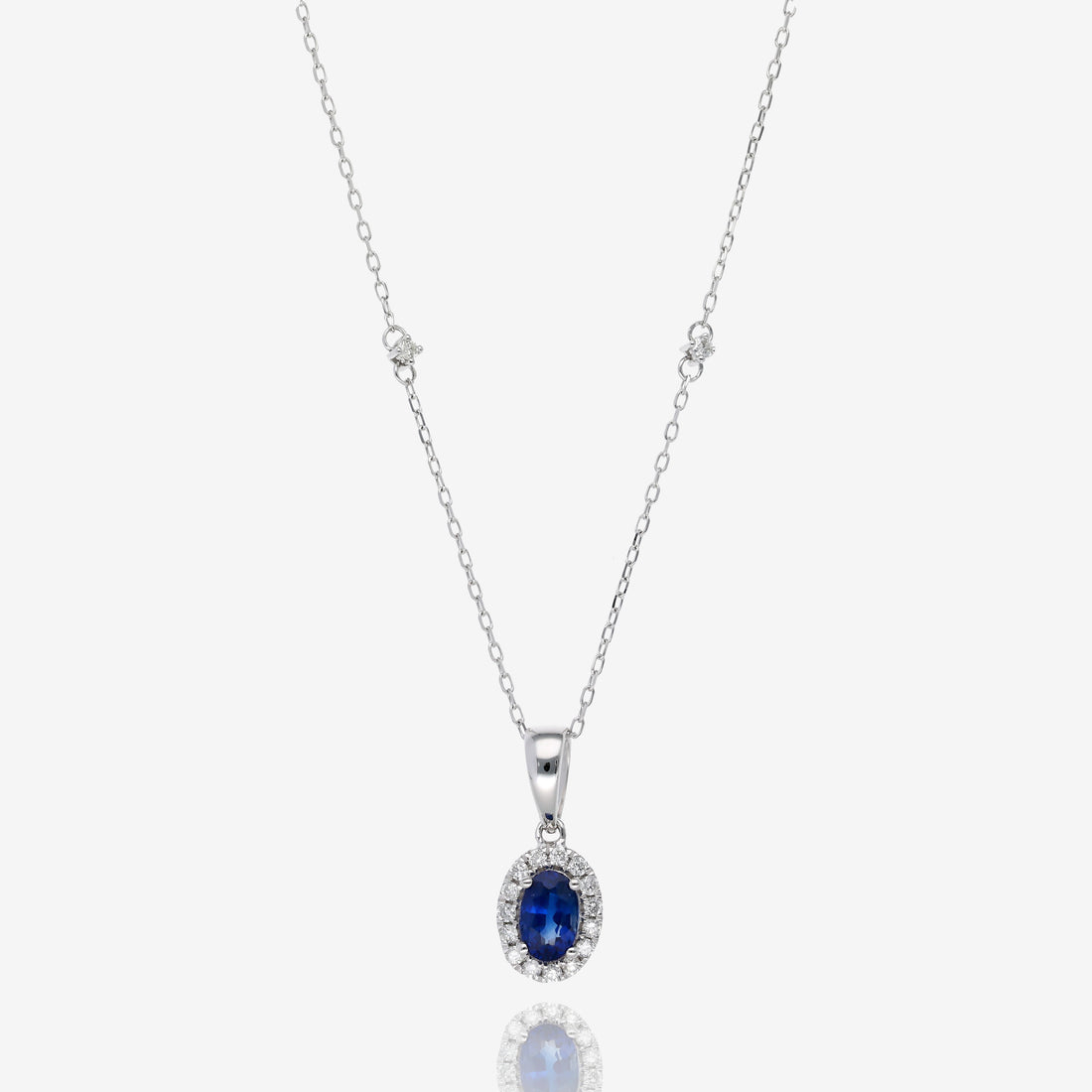 Natural Sapphire and Diamond Halo Pendant in 14K White Gold