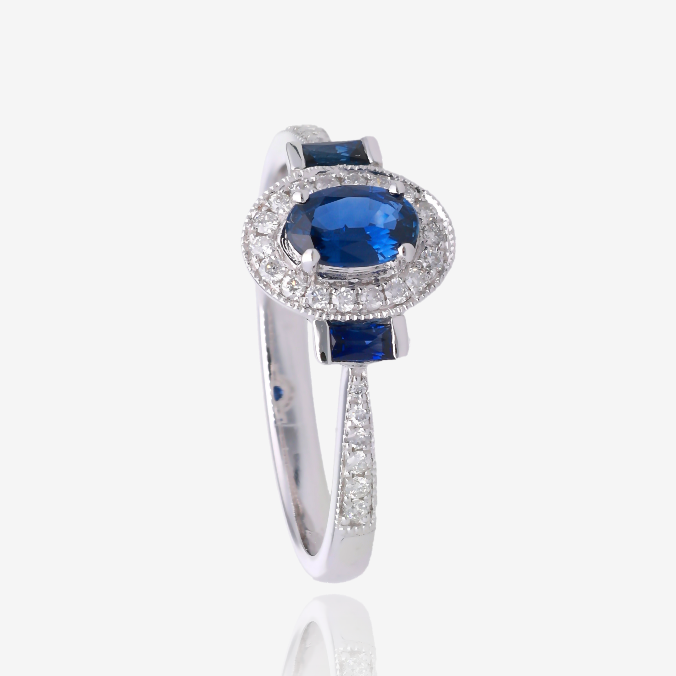 Oval Sapphire and Diamond Vintage Halo Ring in 14K White Gold