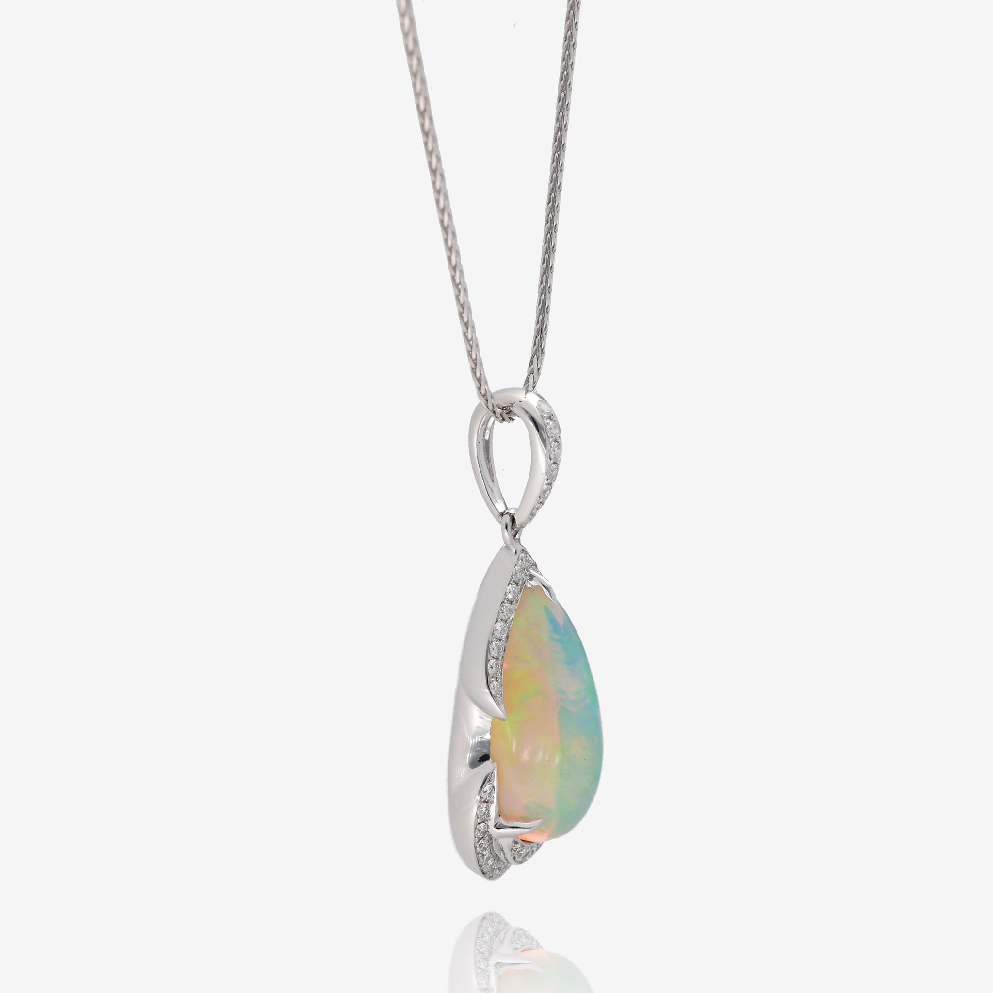Moonlit Fire: 14K White Gold Opal and Diamond Pendant