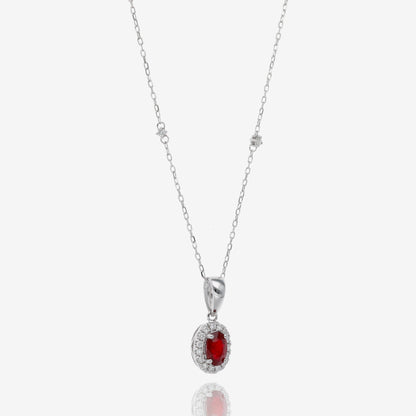 Ruby and Diamond Halo Pendant in 14K White Gold