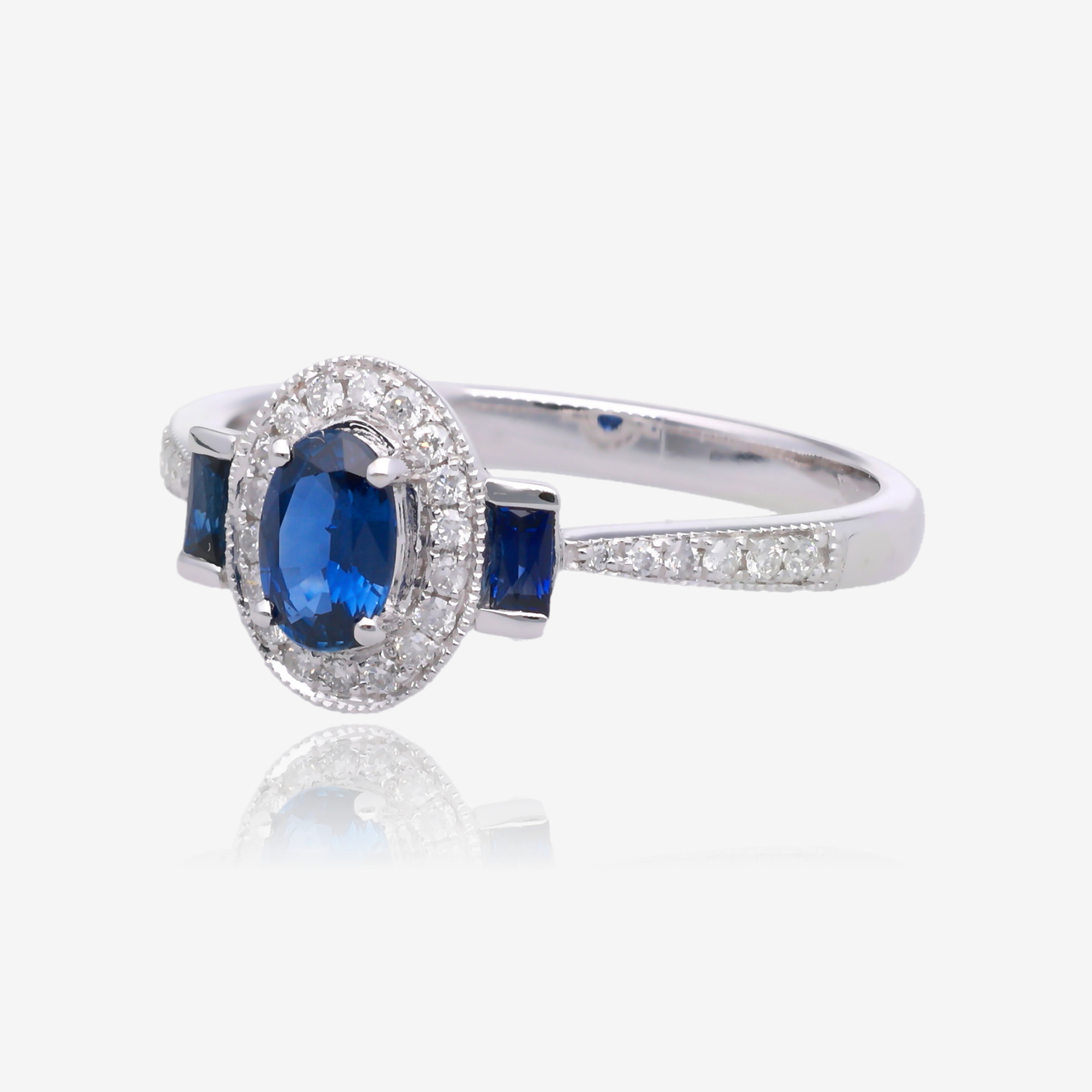 Oval Sapphire and Diamond Vintage Halo Ring in 14K White Gold