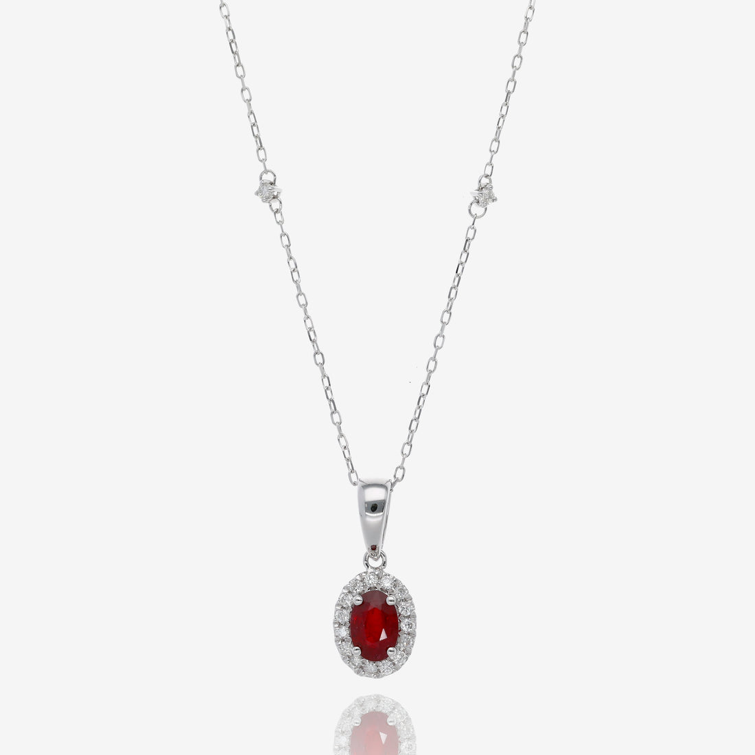 Ruby and Diamond Halo Pendant in 14K White Gold
