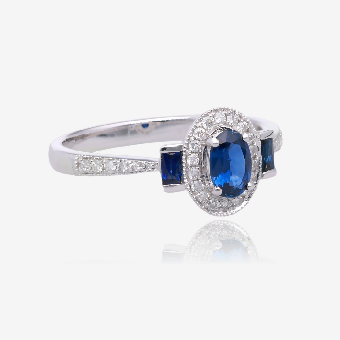 Oval Sapphire and Diamond Vintage Halo Ring in 14K White Gold
