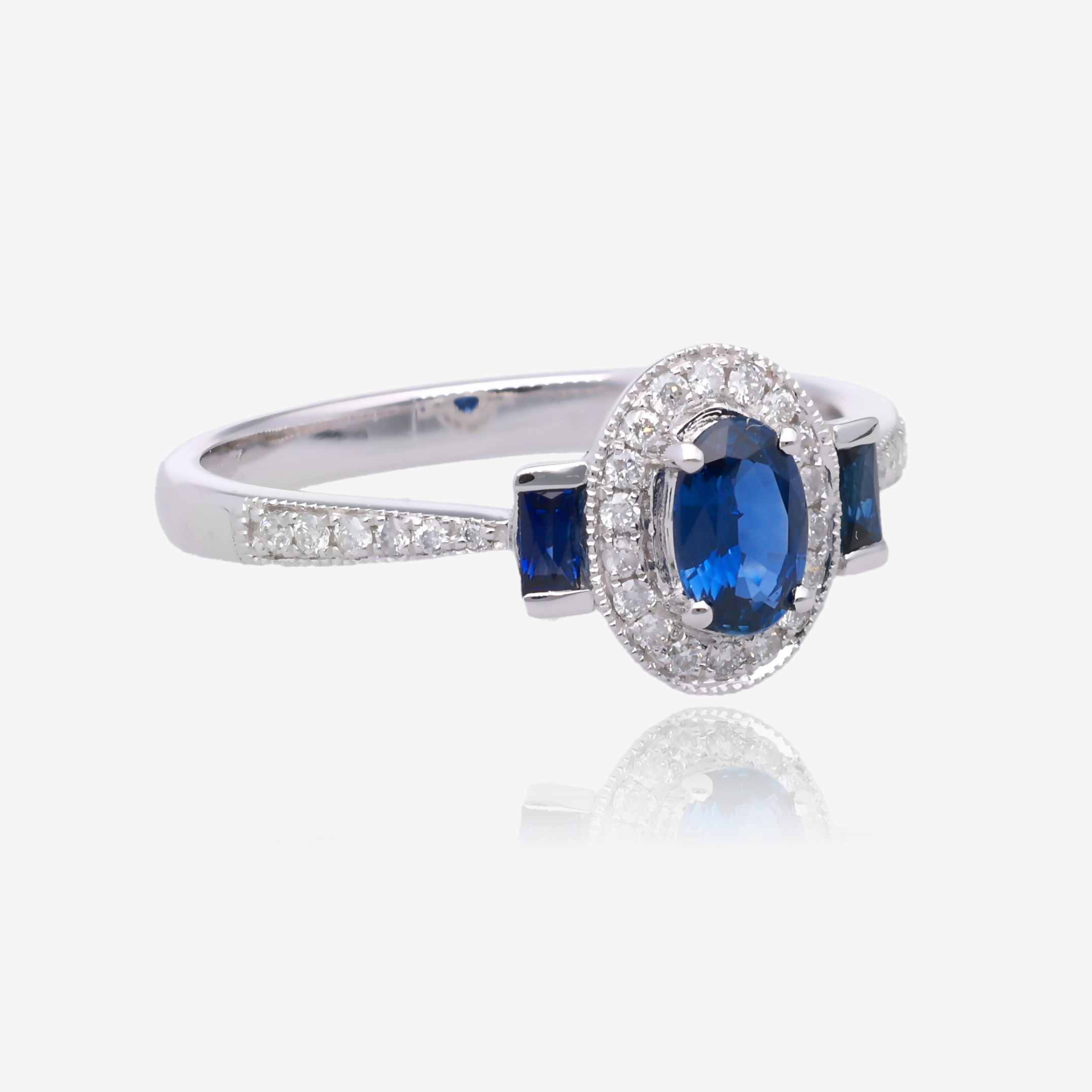 Oval Sapphire and Diamond Vintage Halo Ring in 14K White Gold