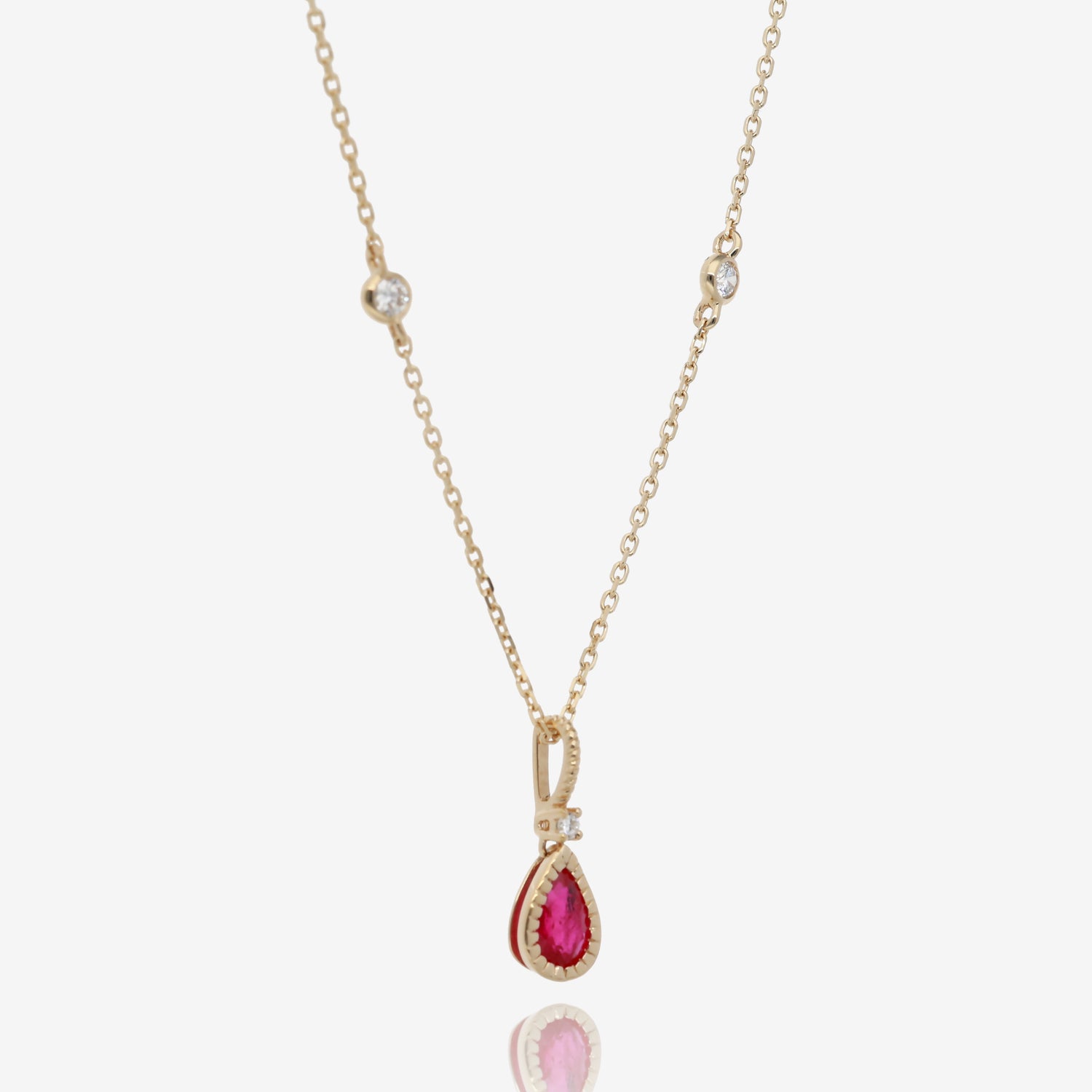 Natural Pear Shaped Ruby and Diamond Pendant in 14K Yellow Gold