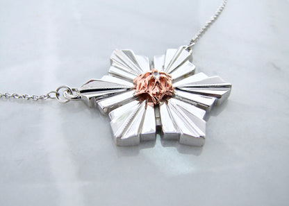 Sterling Silver &amp; 14K Rose Gold
.05ct Diamond