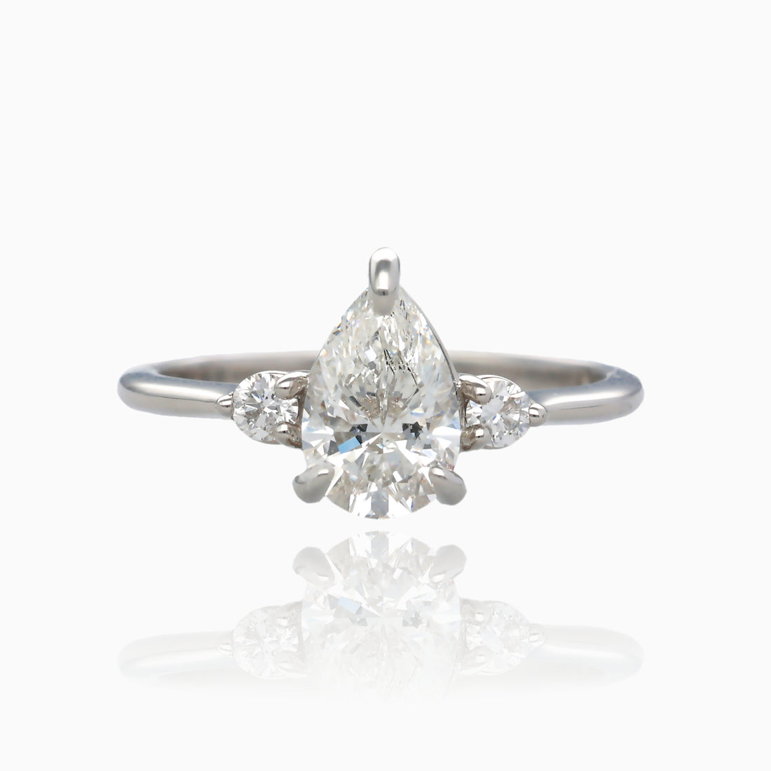 1ct Pear Shape Pure Grown Diamond 1.10TDW Three Stone Platinum Ring