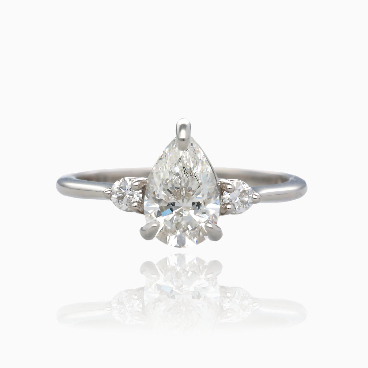 1ct Pear Shape Pure Grown Diamond 1.10TDW Three Stone Platinum Ring