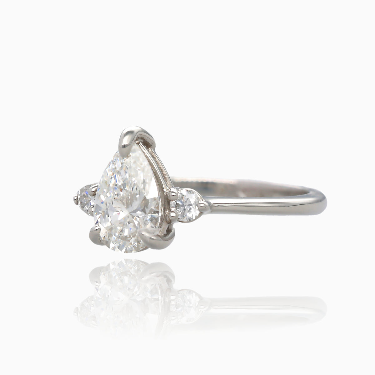 1ct Pear Shape Pure Grown Diamond 1.10TDW Three Stone Platinum Ring
