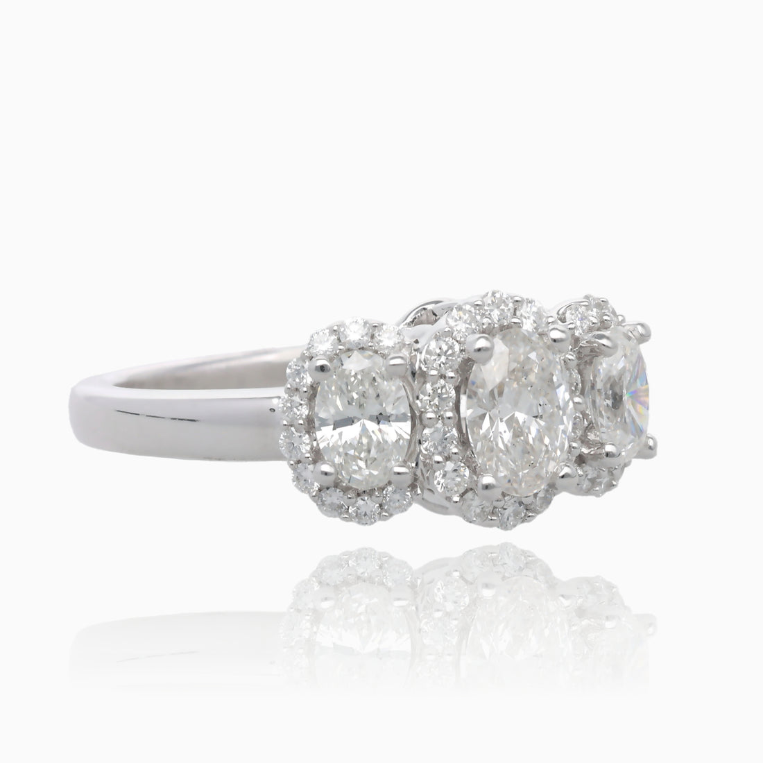 Past Present Future Oval Halo Diamond Ring