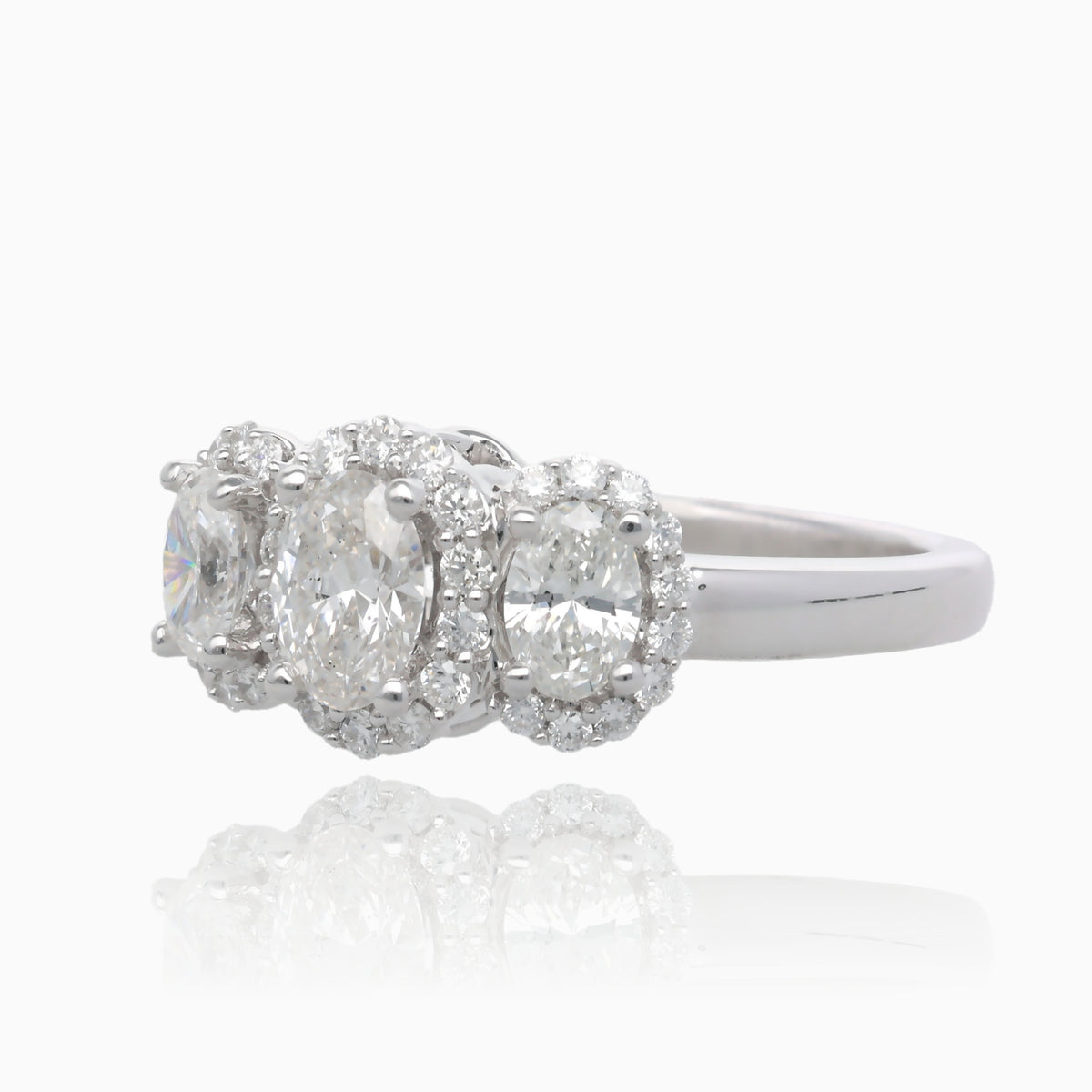 Past Present Future Oval Halo Diamond Ring