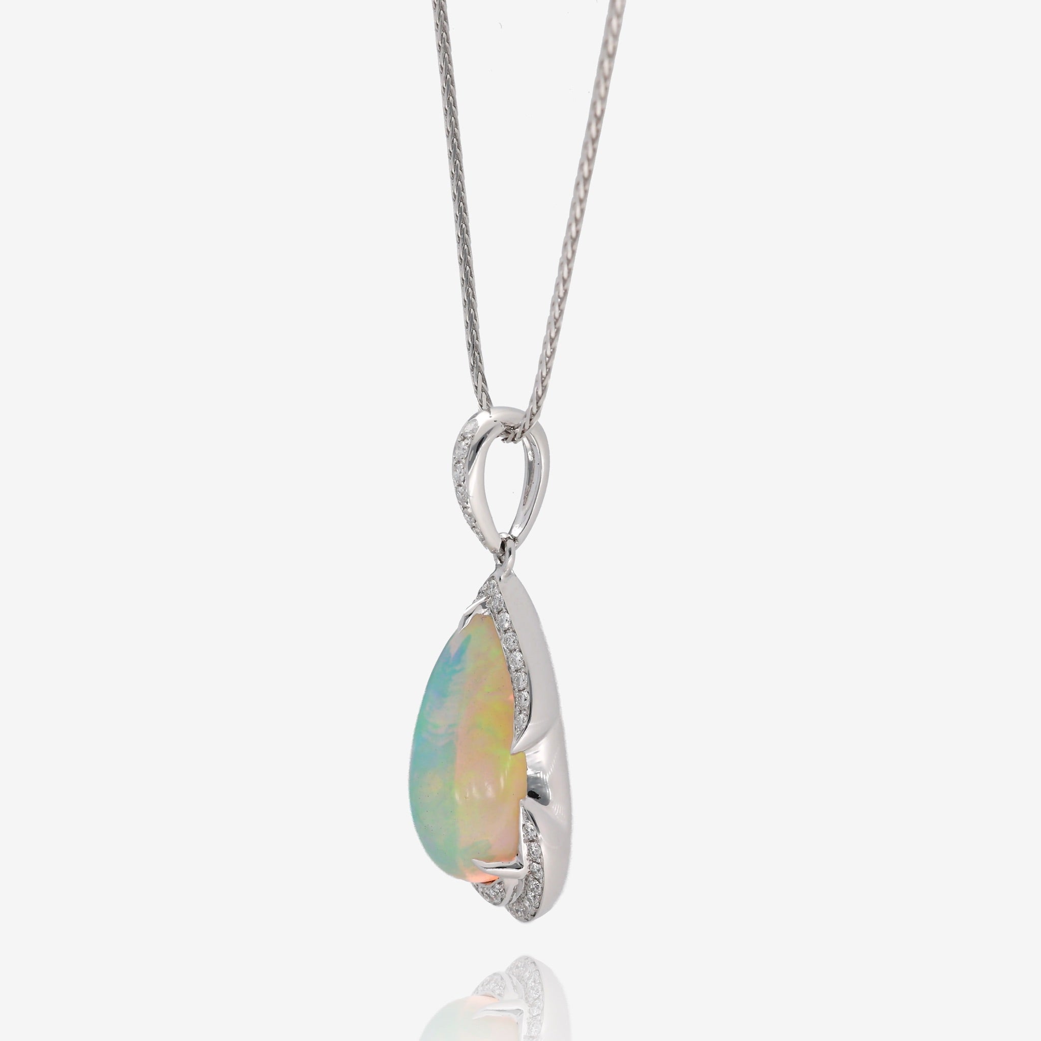 Moonlit Fire: 14K White Gold Opal and Diamond Pendant