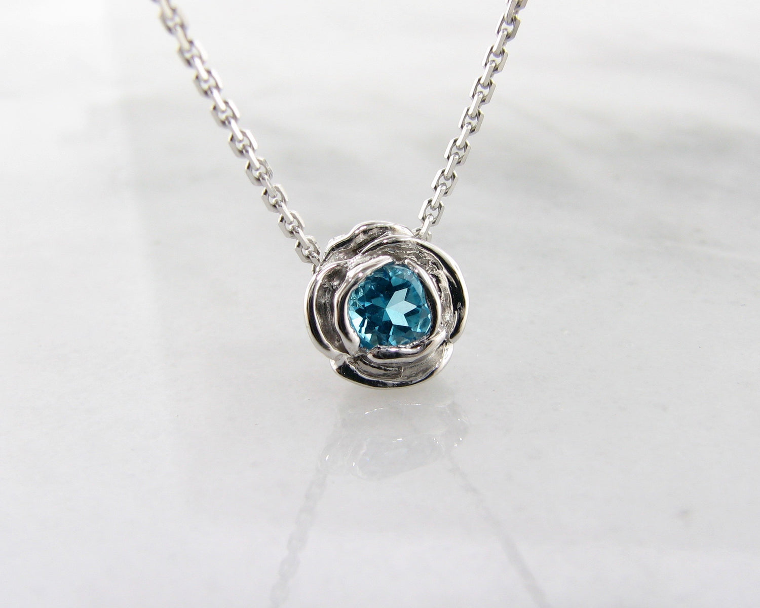 Silver Blue Topaz December Birthstone Necklace, Rose Slider