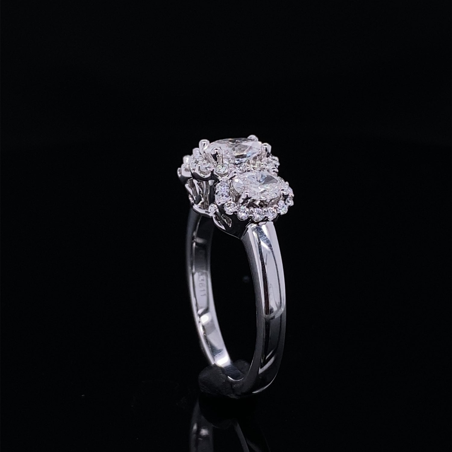 Past Present Future Oval Halo Diamond Ring