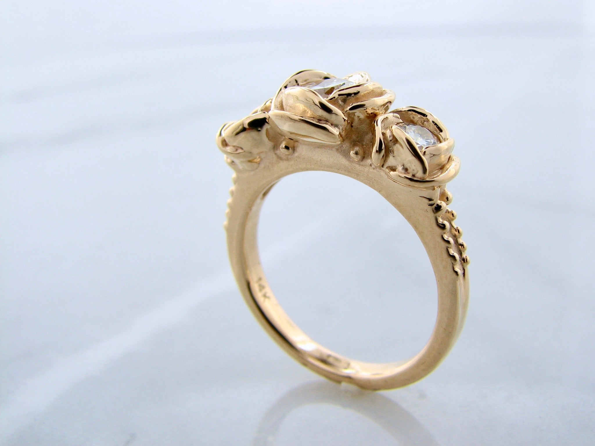 yellow-gold-three-diamond-rose-ring-wexford-jewelers