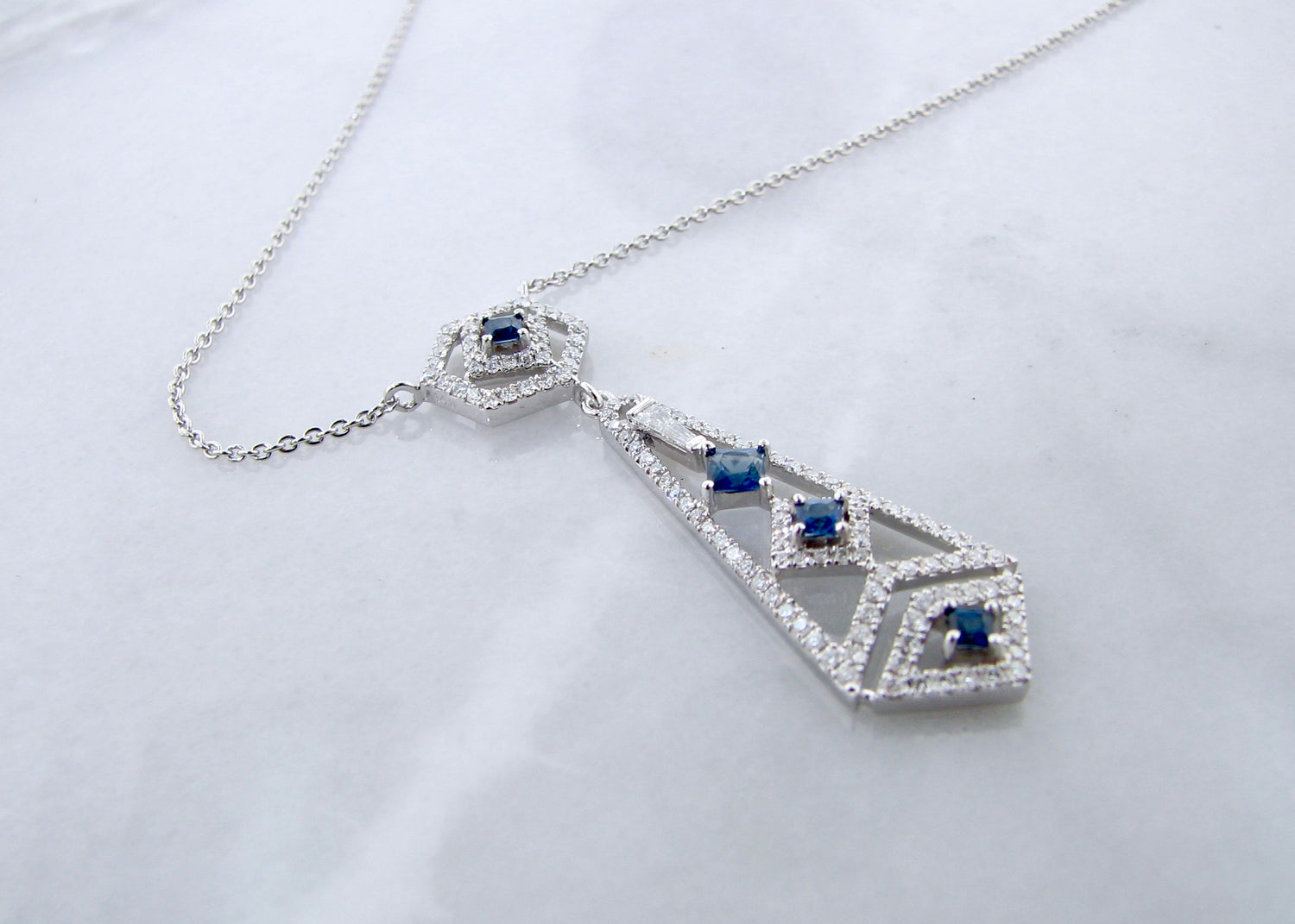 white-gold-art-deco-chandelier-princess-cut-blue-sapphire-necklace