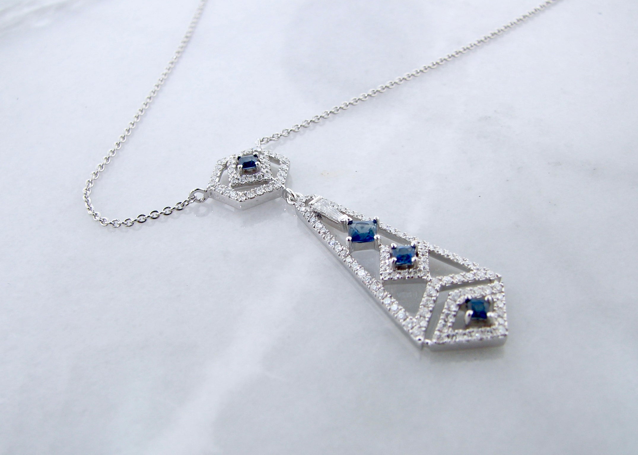 white-gold-art-deco-chandelier-princess-cut-blue-sapphire-necklace