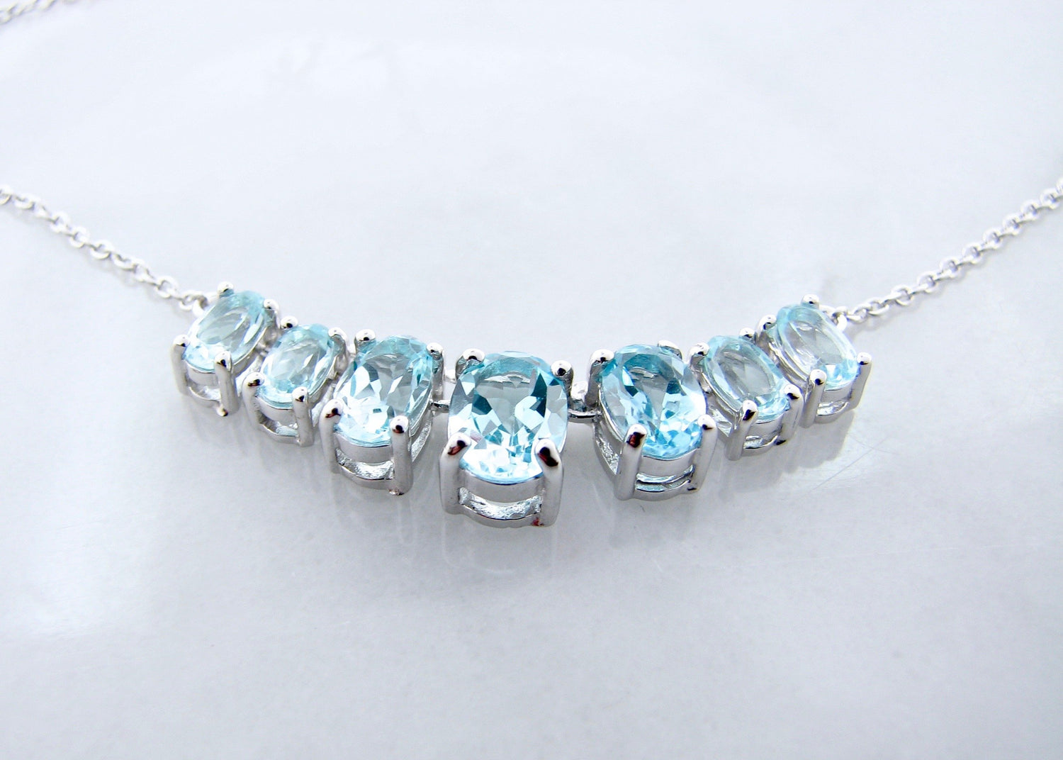 silver-blue-topaz-graduated-split-chain-necklace