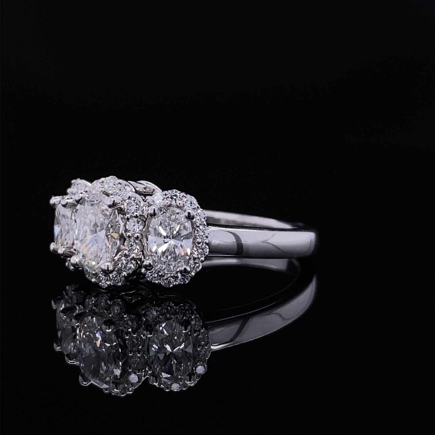 Past Present Future Oval Halo Diamond Ring