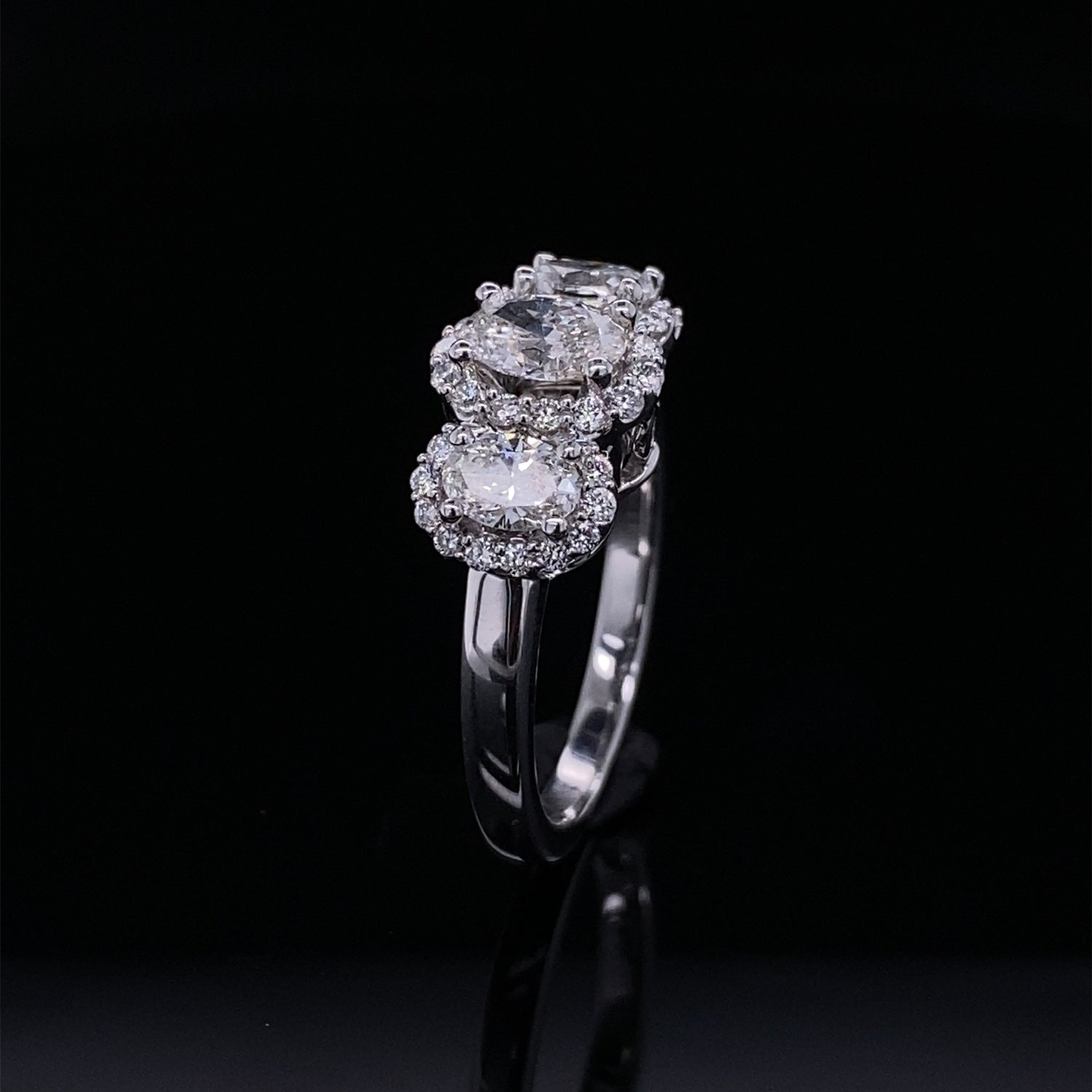 Past Present Future Oval Halo Diamond Ring