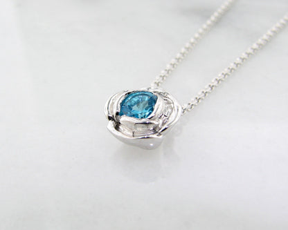 Silver Blue Topaz December Birthstone Necklace, Rose Slider