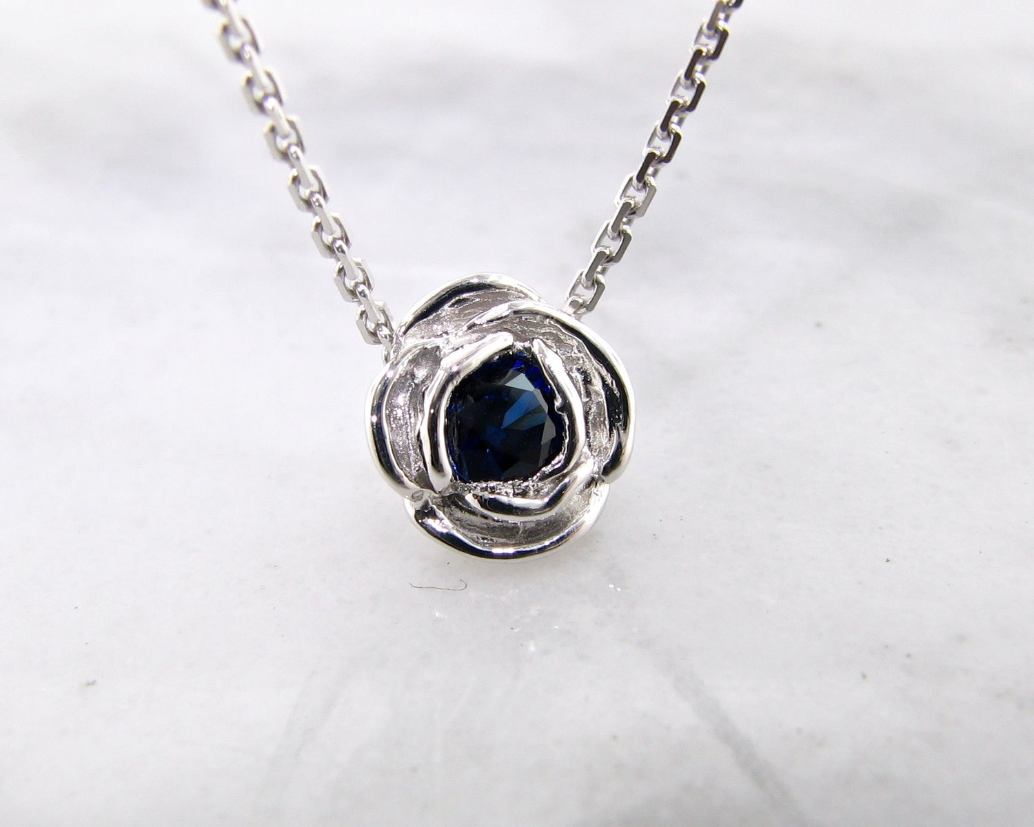 blue-sapphire-silver-rose-slider-necklace-wexford-jewelers